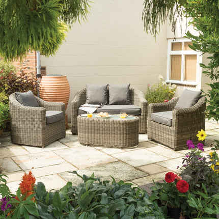 Outdoor Four-Piece Rattan Effect Furniture Set with Frosted Glass Top Table in Neutral Tones