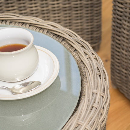 Outdoor Four-Piece Rattan Effect Furniture Set with Frosted Glass Top Table in Neutral Tones