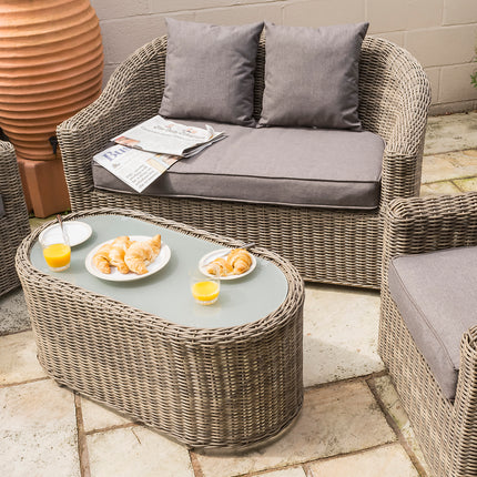 Outdoor Four-Piece Rattan Effect Furniture Set with Frosted Glass Top Table in Neutral Tones
